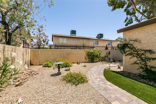 3890 Lancome St, Las Vegas, NV 89115 - view of yard featuring cooling unit
