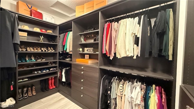 754 Agate Hills St, Las Vegas, NV 89138 - spacious closet featuring wood finished floors