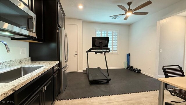 754 Agate Hills St, Las Vegas, NV 89138 - workout area with a sink, a ceiling fan, and baseboards