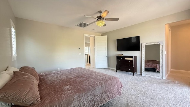 754 Agate Hills St, Las Vegas, NV 89138 - bedroom featuring light colored carpet, baseboards, multiple windows, and ceiling fan