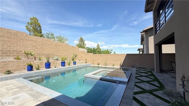 754 Agate Hills St, Las Vegas, NV 89138 - view of pool with a fenced backyard, a pool with connected hot tub, and a patio area
