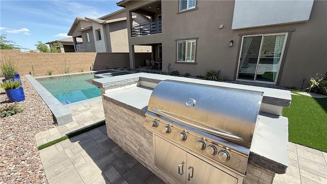 754 Agate Hills St, Las Vegas, NV 89138 - fenced backyard featuring a balcony and a patio area