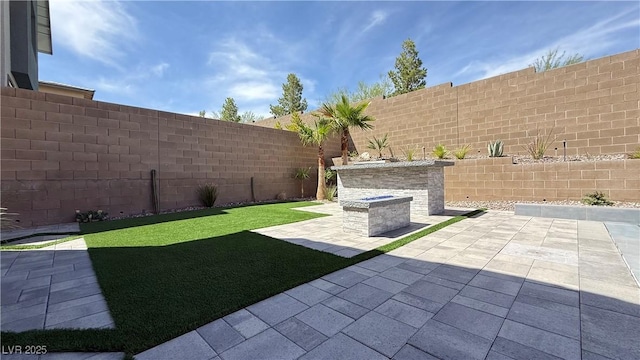 754 Agate Hills St, Las Vegas, NV 89138 - fenced backyard featuring a patio
