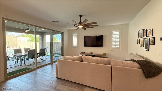 754 Agate Hills St, Las Vegas, NV 89138 - living room with ceiling fan, healthy amount of natural light, and wood finished floors