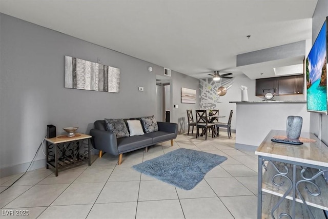4200 S Valley View Blvd Unit 1007, Las Vegas, NV 89103 - living area featuring light tile patterned floors and ceiling fan