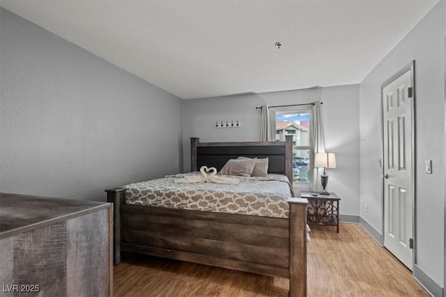 4200 S Valley View Blvd Unit 1007, Las Vegas, NV 89103 - bedroom featuring wood finished floors and baseboards
