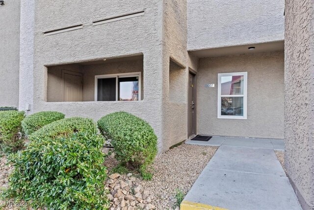 4200 S Valley View Blvd Unit 1007, Las Vegas, NV 89103 - view of exterior entry featuring stucco siding