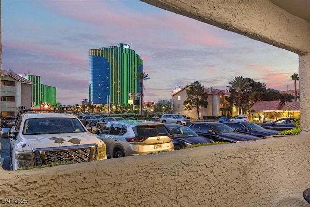 4200 S Valley View Blvd Unit 1007, Las Vegas, NV 89103 - parking at dusk with uncovered parking