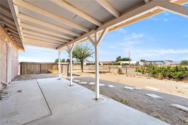 2440 Homestead Rd, Pahrump, NV 89048 - fenced backyard featuring a patio area
