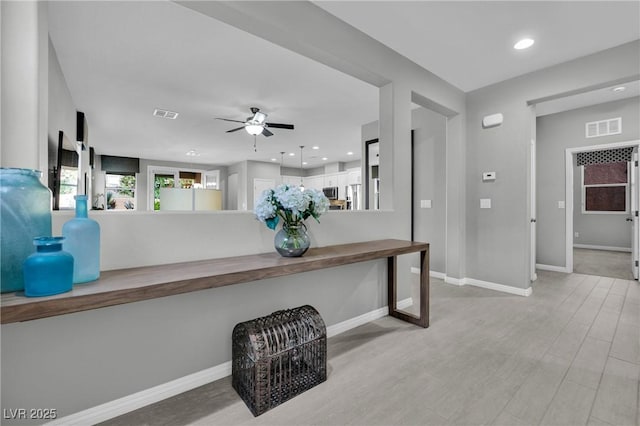 708 Kibbey St, Las Vegas, NV 89178 - kitchen featuring a ceiling fan, baseboards, wood finished floors, appliances with stainless steel finishes, and recessed lighting