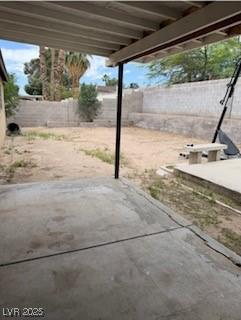 5389 Spencer St, Las Vegas, NV 89119 - fenced backyard featuring a patio