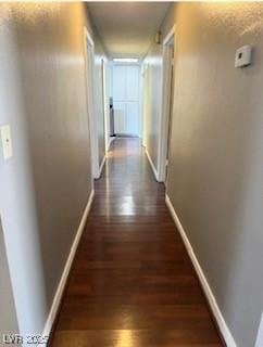 5389 Spencer St, Las Vegas, NV 89119 - corridor featuring wood finished floors and baseboards
