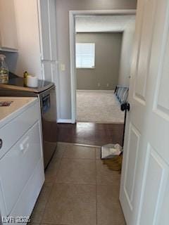 5389 Spencer St, Las Vegas, NV 89119 - laundry room with washing machine and dryer and tile patterned flooring