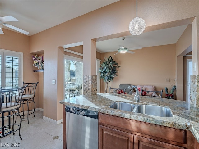 2521 Seascape Dr, Las Vegas, NV 89128 - kitchen with dishwasher, a ceiling fan, a sink, and healthy amount of natural light