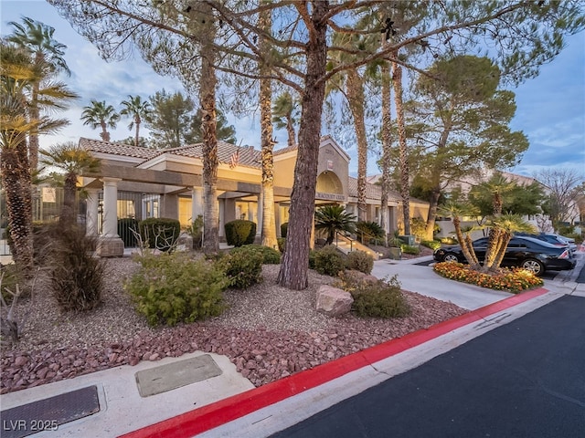2521 Seascape Dr, Las Vegas, NV 89128 - view of front of property with a tile roof and stucco siding