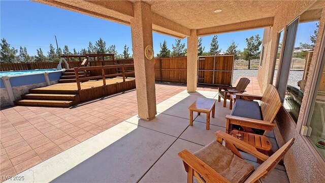 1361 Moose St, Pahrump, NV 89048 - fenced backyard with a patio