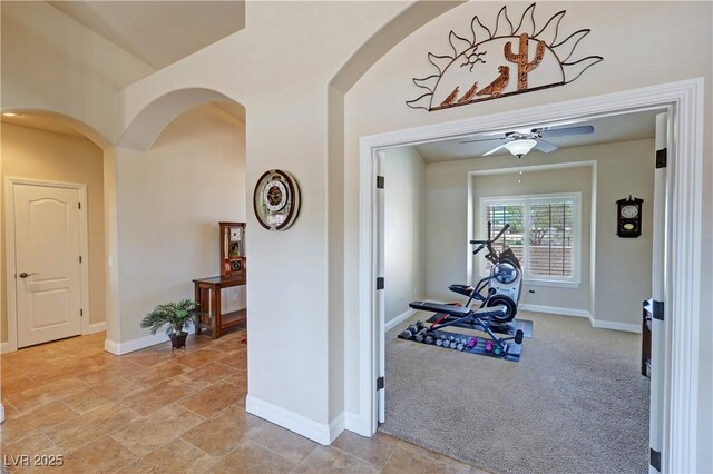 1361 Moose St, Pahrump, NV 89048 - exercise area featuring a ceiling fan, arched walkways, and baseboards