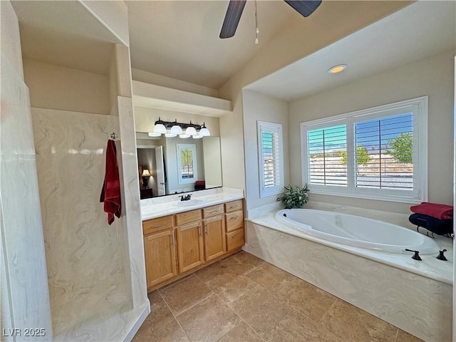 1361 Moose St, Pahrump, NV 89048 - full bathroom featuring vanity, a garden tub, and ceiling fan