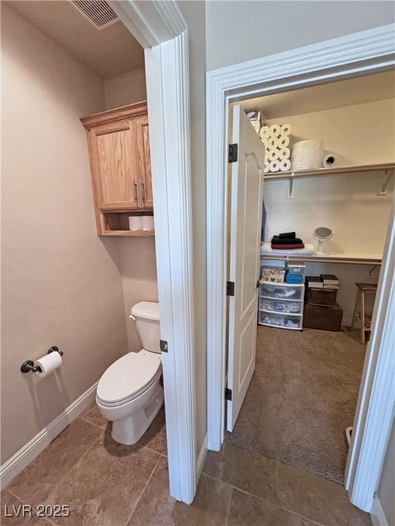 1361 Moose St, Pahrump, NV 89048 - bathroom with toilet and baseboards