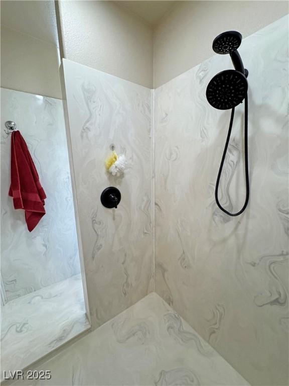 1361 Moose St, Pahrump, NV 89048 - full bathroom featuring a marble finish shower