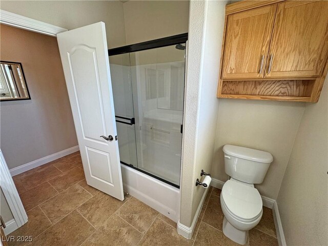 1361 Moose St, Pahrump, NV 89048 - full bath featuring baseboards, toilet, and bath / shower combo with glass door