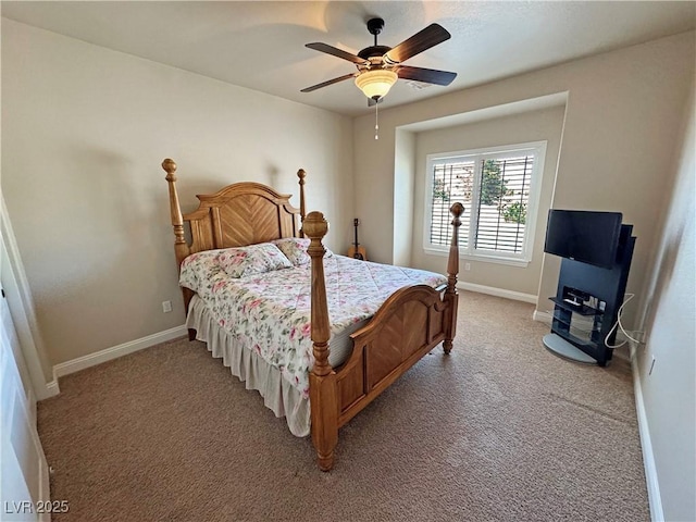 1361 Moose St, Pahrump, NV 89048 - bedroom featuring baseboards, light carpet, and ceiling fan