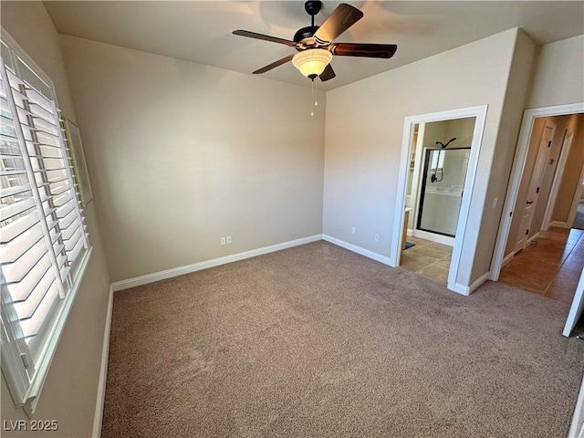 1361 Moose St, Pahrump, NV 89048 - unfurnished bedroom with carpet, baseboards, ensuite bath, and ceiling fan
