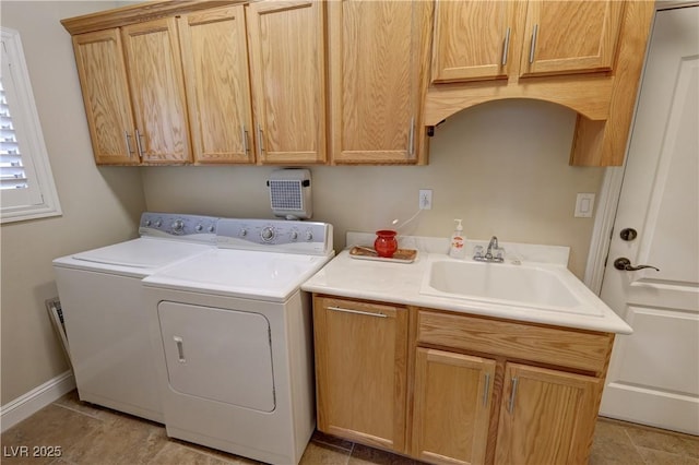 1361 Moose St, Pahrump, NV 89048 - washroom featuring separate washer and dryer, cabinet space, and baseboards