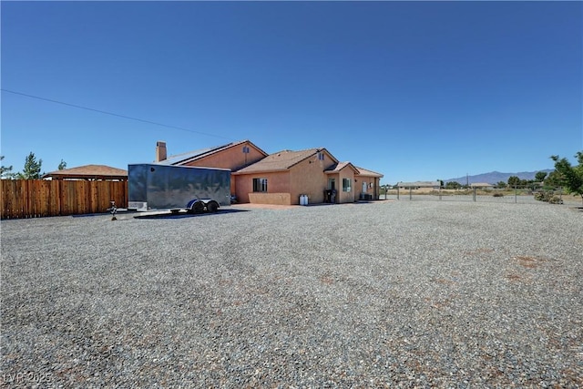 1361 Moose St, Pahrump, NV 89048 - back of house featuring a mountain view