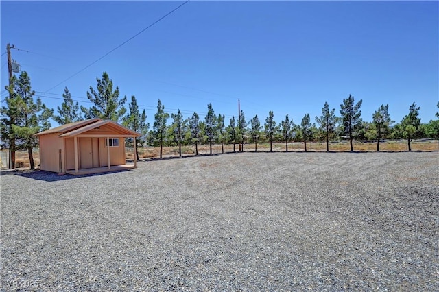 1361 Moose St, Pahrump, NV 89048 - view of yard featuring an outbuilding