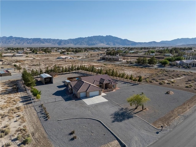 1361 Moose St, Pahrump, NV 89048 - view from above of property with a mountain backdrop and a desert landscape