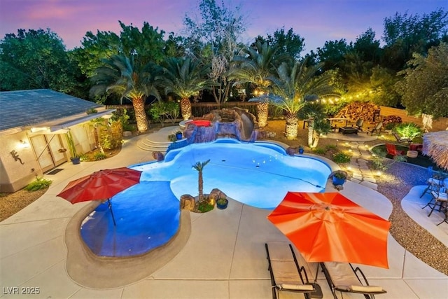 7001 Via Locanda Ave, Las Vegas, NV 89131 - pool at dusk with a patio and an outdoor pool