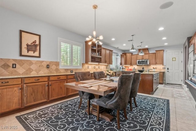 7001 Via Locanda Ave, Las Vegas, NV 89131 - dining space with recessed lighting, light tile patterned flooring, and a chandelier