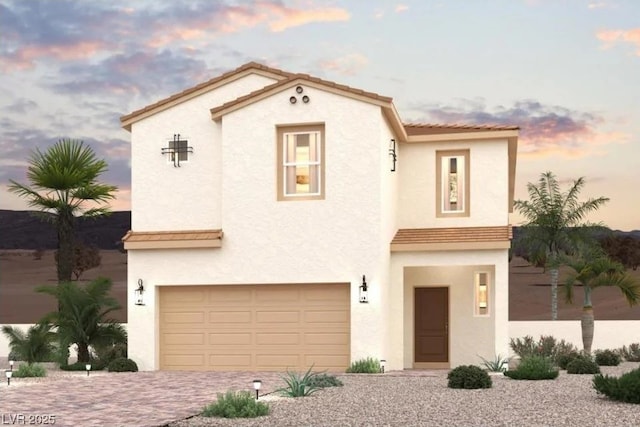 9957 Ruby Dome Ave, Las Vegas, NV 89178 - mediterranean / spanish-style home featuring stucco siding, a garage, driveway, and a tile roof