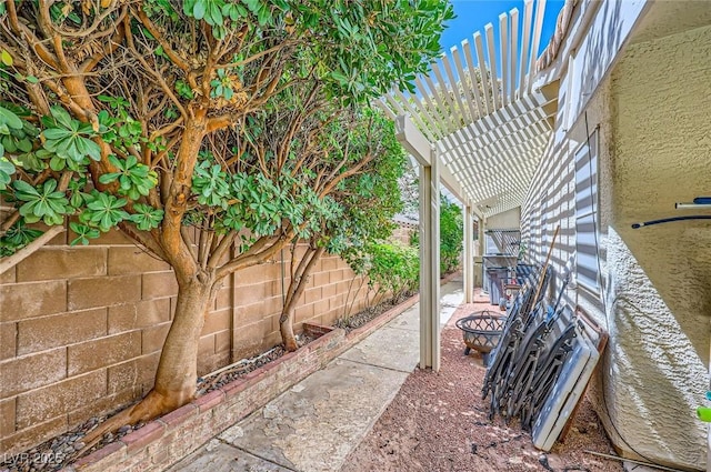 1905 Dakota Hills Ave, Las Vegas, NV 89123 - fenced backyard featuring a pergola