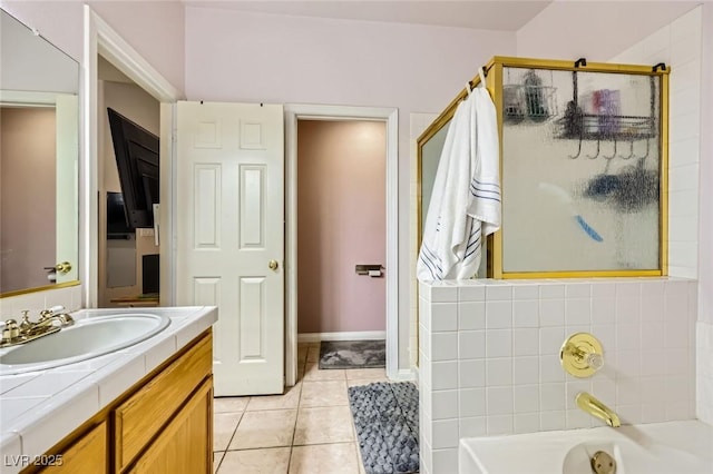 1905 Dakota Hills Ave, Las Vegas, NV 89123 - full bathroom featuring a stall shower, tile patterned flooring, a garden tub, and vanity