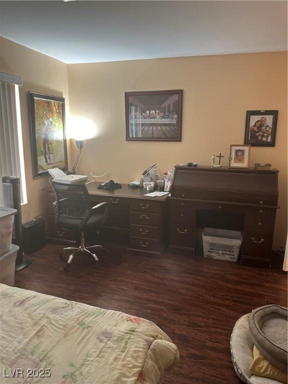 7850 Flagler St, Las Vegas, NV 89139 - bedroom with dark wood-style floors and an office area