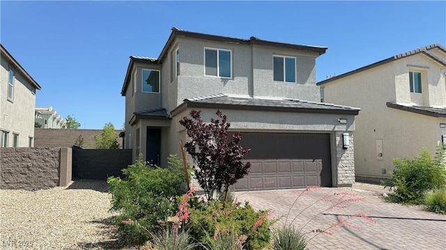 2924 Sunday Silence Rd, North Las Vegas, NV 89086 - traditional home with a garage, stucco siding, and decorative driveway