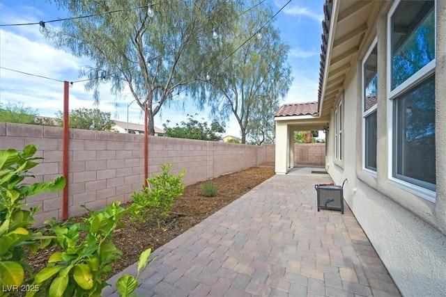 4020 Recktenwall Ave, North Las Vegas, NV 89081 - fenced backyard with a patio area