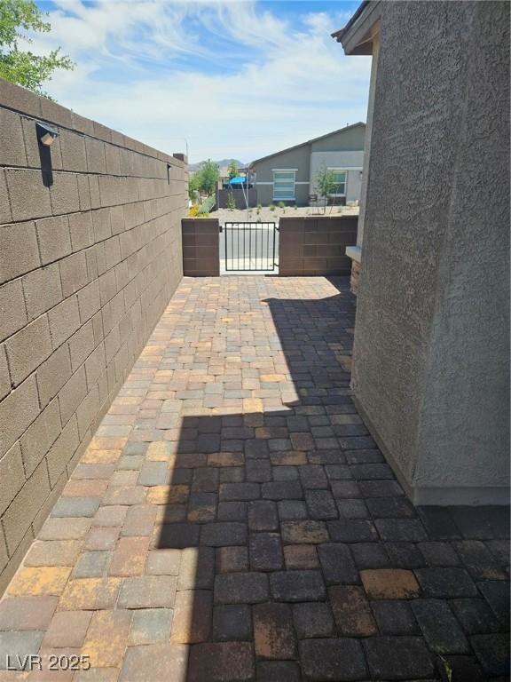289 Aravalli Crest St, Henderson, NV 89015 - view of patio featuring a gate