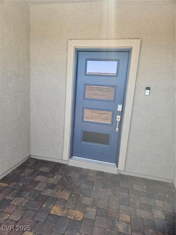 289 Aravalli Crest St, Henderson, NV 89015 - property entrance featuring stucco siding