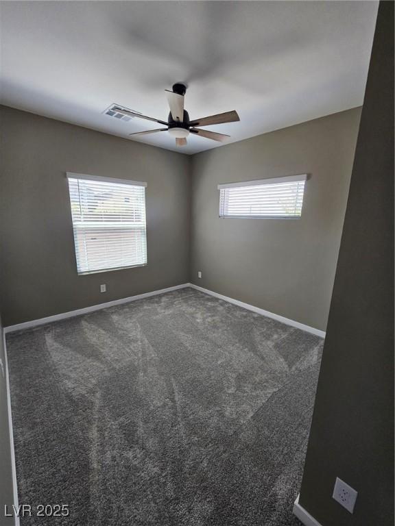 289 Aravalli Crest St, Henderson, NV 89015 - unfurnished room featuring a ceiling fan, baseboards, and carpet floors