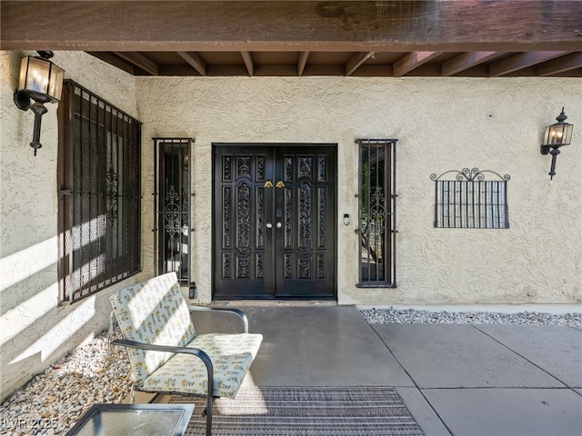 2104 Plaza De La Candela, Las Vegas, NV 89102 - entrance to property featuring stucco siding and covered porch