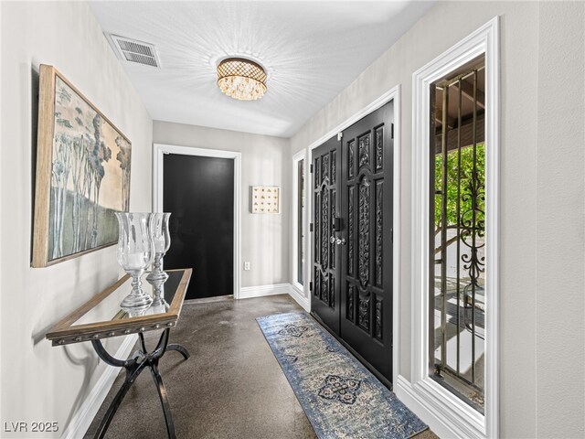 2104 Plaza De La Candela, Las Vegas, NV 89102 - foyer with a chandelier and baseboards