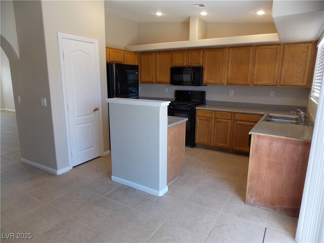 319 Mulberry Glen Dr, North Las Vegas, NV 89031 - kitchen featuring black appliances, a sink, arched walkways, vaulted ceiling, and a center island