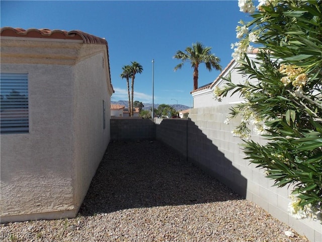319 Mulberry Glen Dr, North Las Vegas, NV 89031 - view of side of home with stucco siding