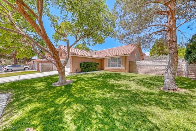 5639 Guiding Star Cir, North Las Vegas, NV 89031 - ranch-style house with stucco siding, a tile roof, an attached garage, and concrete driveway