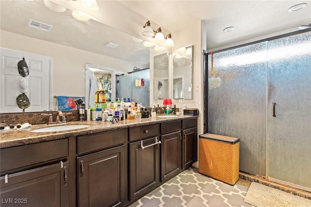 6714 Flamenco Ct, Las Vegas, NV 89139 - bathroom with a stall shower and double vanity