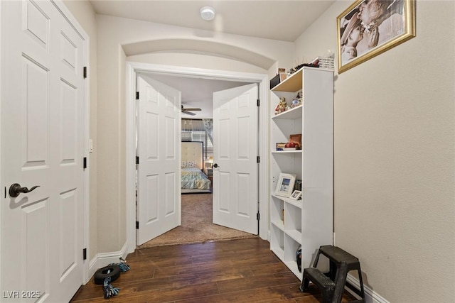 6714 Flamenco Ct, Las Vegas, NV 89139 - hall with dark wood-style floors and baseboards
