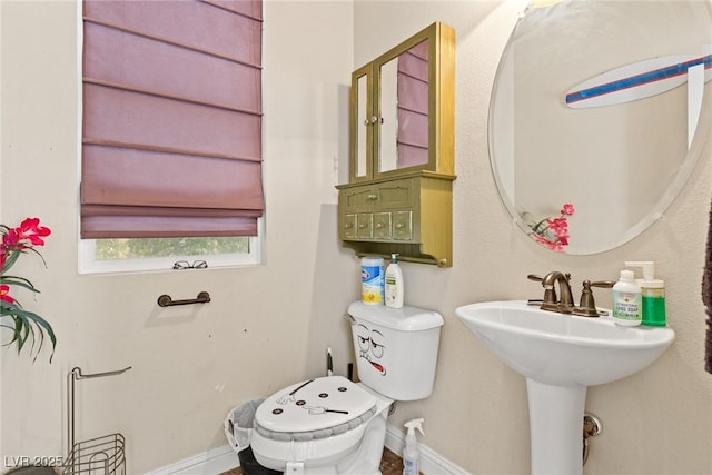 6714 Flamenco Ct, Las Vegas, NV 89139 - half bathroom featuring toilet and baseboards